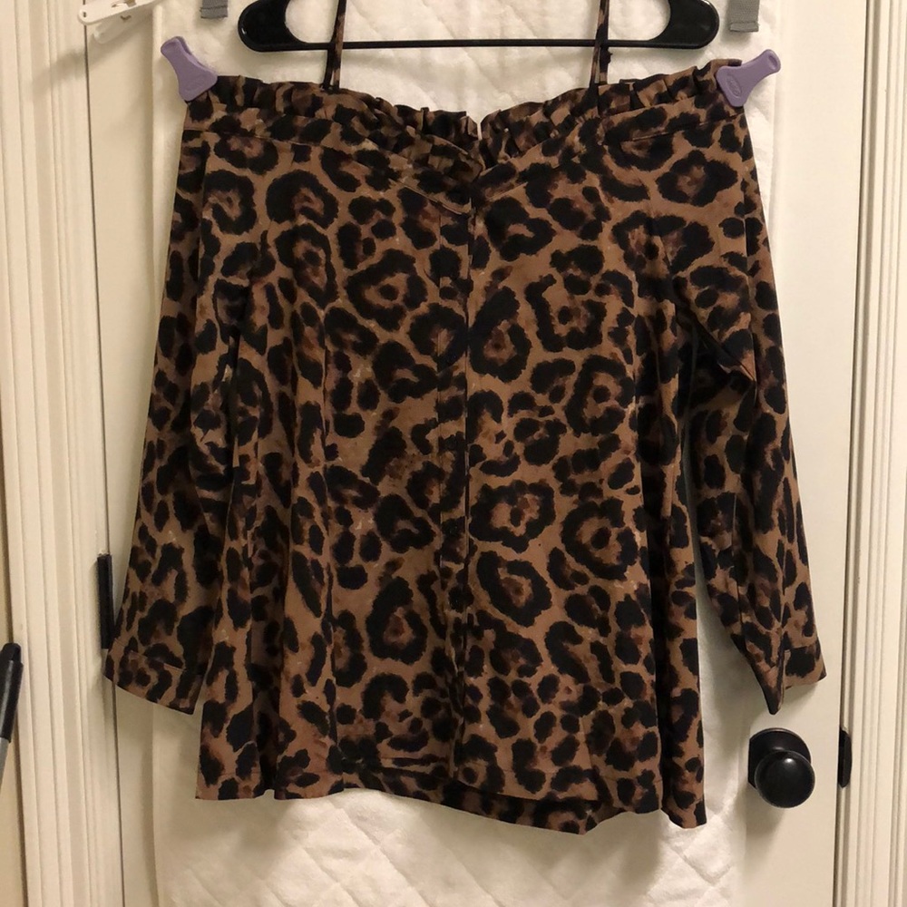 Leopard print off the shoulder shirt.